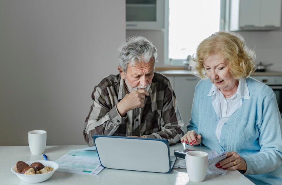 old couple doing a financial reset